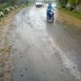 Warga di Sekitar Jalan KH Hasan Arief Kewalahan dengan Banjir