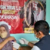 BIN Jabar Buka Vaksinasi Covid-19 hari ke-9 di Garut, Sambil Bagikan Sembako di Desa Sukarasa