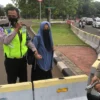 Kronologi Wanita Bercadar Bawa Senjata Api Menerobos Istana Negara
