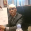 ustadz Buddy Oconk, Ketua DPC LPM Tarogong Kidul menunjukkan LP. Buddy Oconk melaporkan oknum pegawai RSUD dr. Slamet Garut ke Polisi