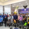 40 orang penyandang disabilitas mendapatkan bantuan kursi roda dan santunan